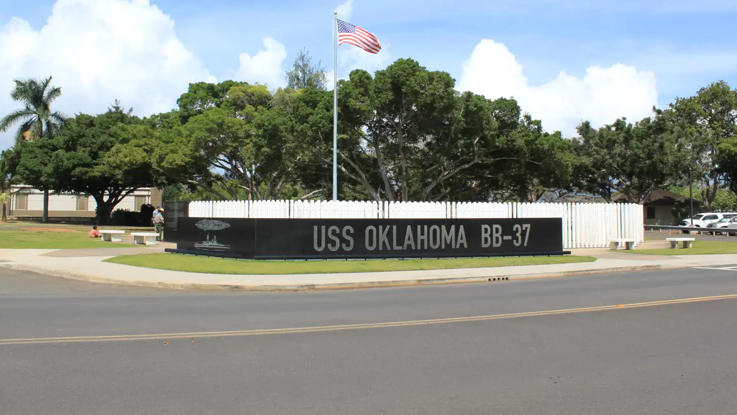 USS Oklahoma Memorial with 429 white marble standards on Ford Island